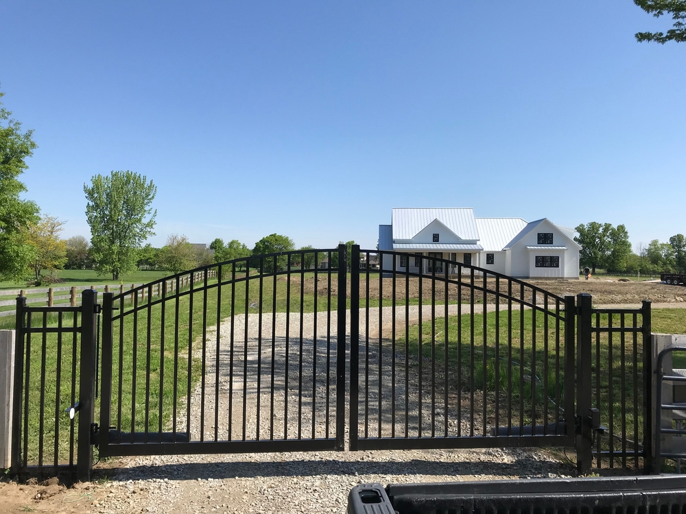 Beautiful custom driveway gate enhancing security and style for the home