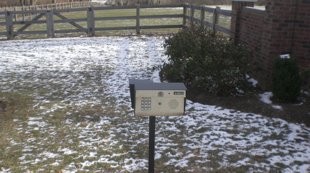 Outdoor telephone entry system for secure property access