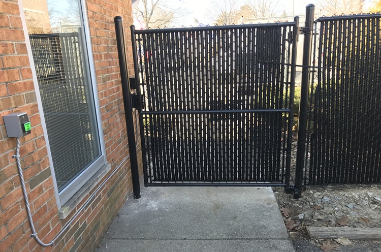 Mounted access control panel for gate with secure entry