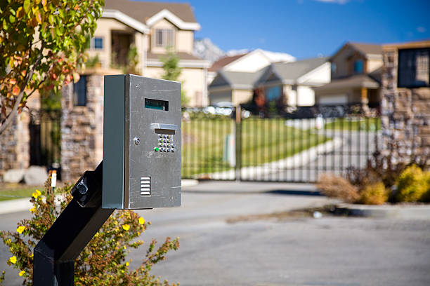 A well-maintained gooseneck pedestal at a property entrance