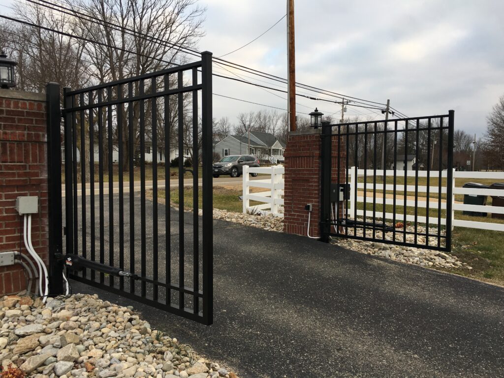 Automatic sliding gate with electric opener for secure access control