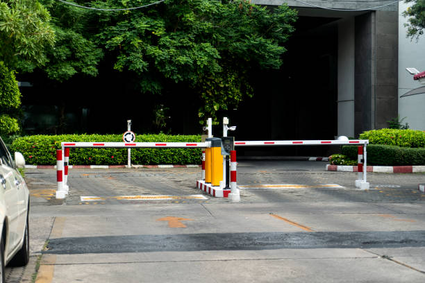Barrier arm gate with security features at a private home entrance