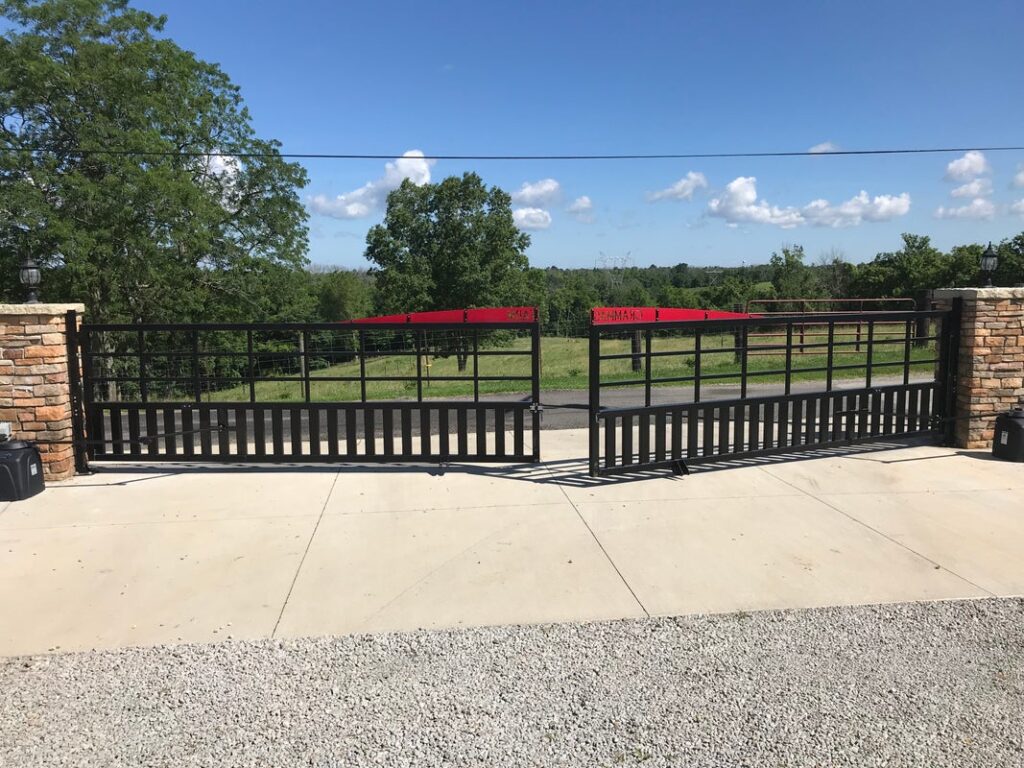 Remote-controlled gates installed on a concrete driveway